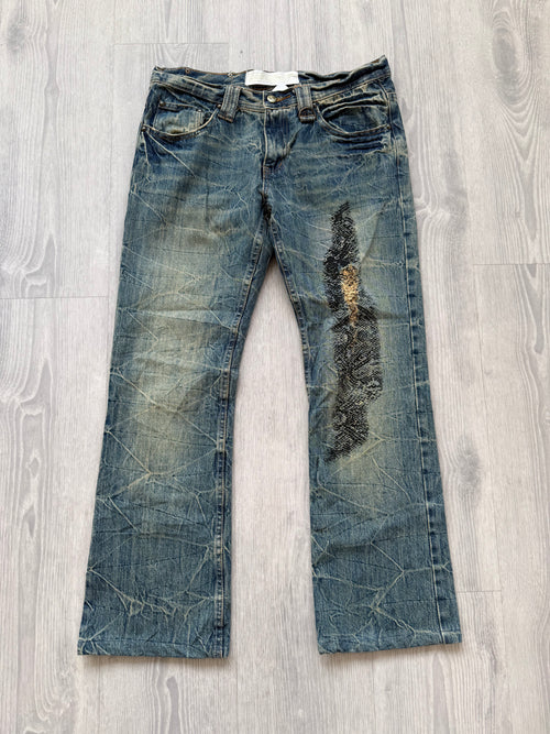 Baggy jeans with lace print