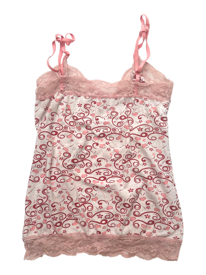 Pink top with hearts and swirls