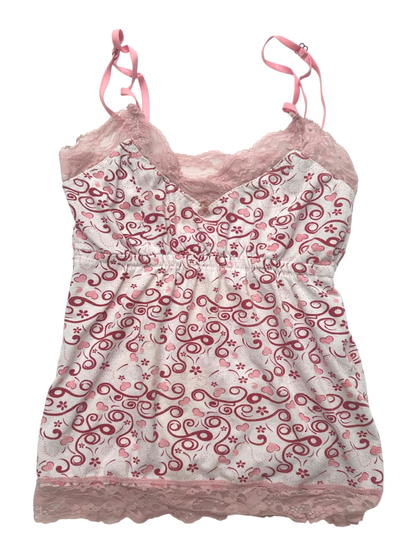 Pink top with hearts and swirls